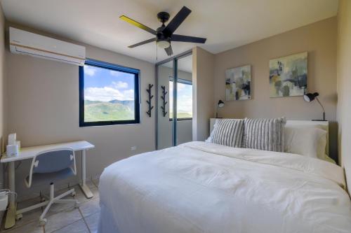 a bedroom with a bed and a desk and a window at Vista Serena in Salinas