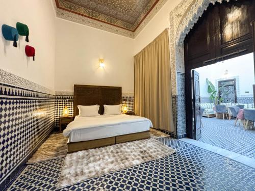 a bedroom with a bed in a room at Riad Azul Fes & SPA in Fez