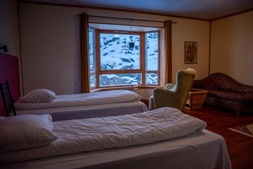 Llit o llits en una habitació de Arran Nordkapp