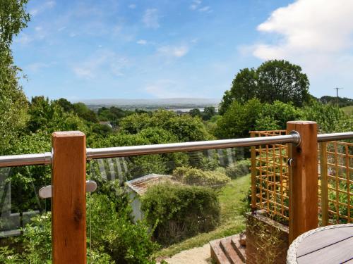 a view from the balcony of a house at Hillside Hideaway in Flaxley