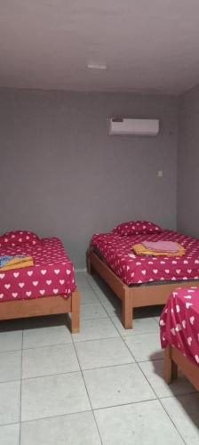 Vuode tai vuoteita majoituspaikassa Radha Krishna