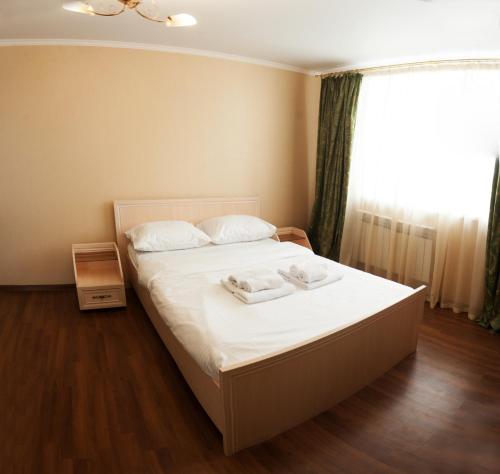 מיטה או מיטות בחדר ב-1k Apartment in the center