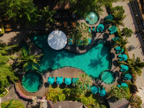 an aerial view of a pool at a resort at Vila Ombak in Gili Trawangan