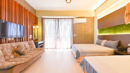 Postel nebo postele na pokoji v ubytování Minsuku B&B