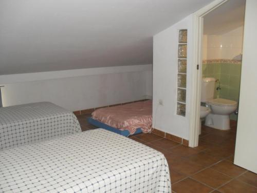 A bed or beds in a room at Alcaraván 32