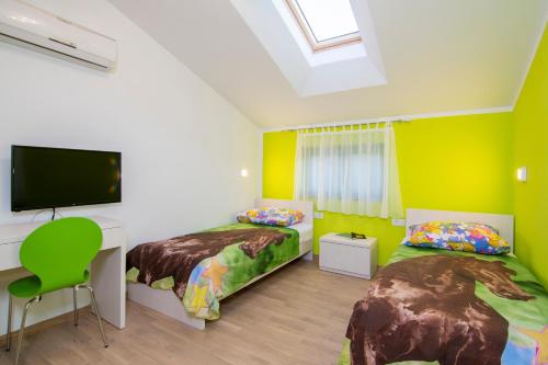 Postel nebo postele na pokoji v ubytování Villa Mare & Monti Istra