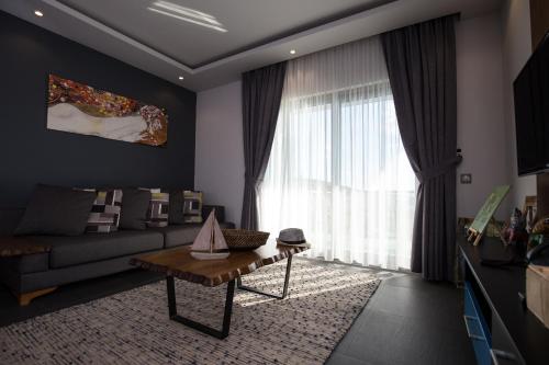 Televisyen dan/atau pusat hiburan di Degirmenburnu Residence