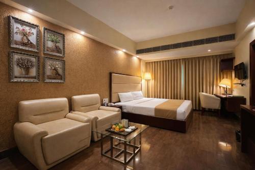 เตียงในห้องที่ Hotel O2 Oxygen