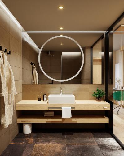 a bathroom with a sink and a mirror at 1A Landhotel Schicklberg in Kremsmünster