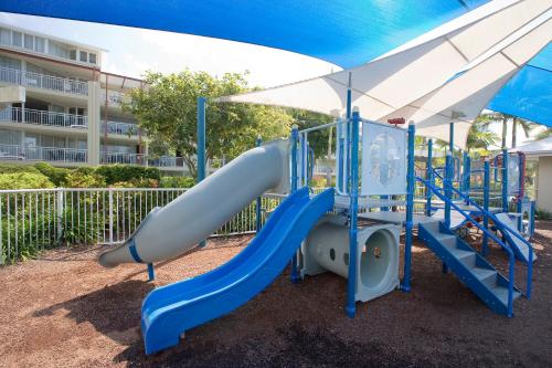 a playground with a slide in a park at BreakFree Alexandra Beach in Alexandra Headland