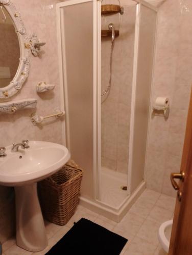 a bathroom with a shower and a sink at Residence Costa Caddu San Teodoro in Porto Ottiolu