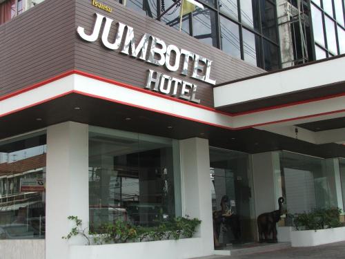 a jumeirah hotel sign on the front of a building at Jumbotel Hotel in Bangkok