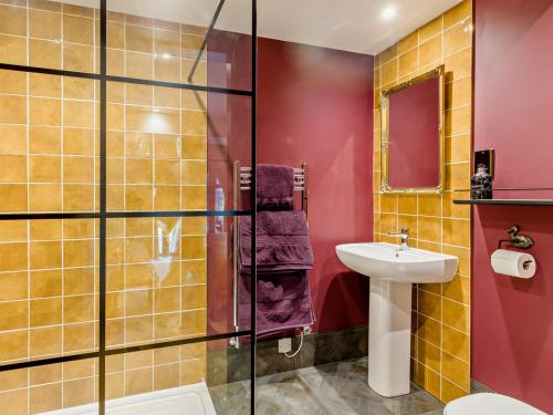a bathroom with a toilet sink and a shower at 2 Bed in Stoke-on-trent oc-94790 in Waterhouses