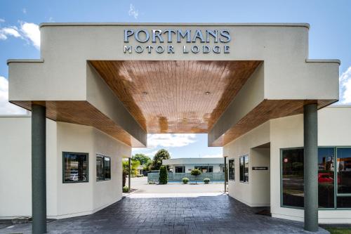 a building with a sign that reads potomans motor lodge at Portmans Motor Lodge in Hastings