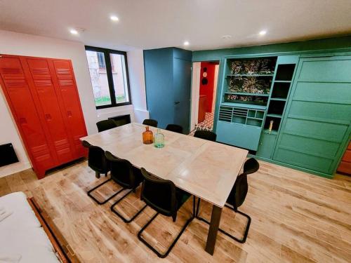 a dining room with a table and chairs at Milliaux - Bail Partner in Auxerre
