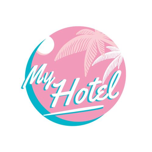 a pink hotel sign with a palm tree at My Hotel Cesenatico in Cesenatico