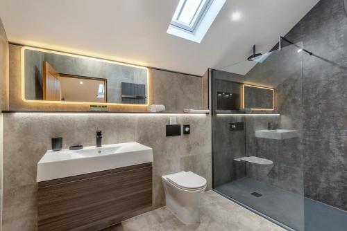 a bathroom with a sink and a toilet and a shower at 2 Bed in Brampton oc-c34637 in Brampton