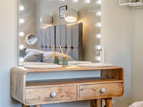 a dressing table in front of a mirror at 3 Bed in Brecon oc-92341 in Brecon