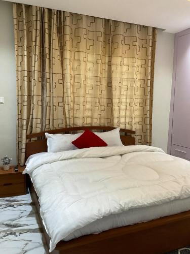 Krevet ili kreveti u jedinici u okviru objekta Studio flat in Legon