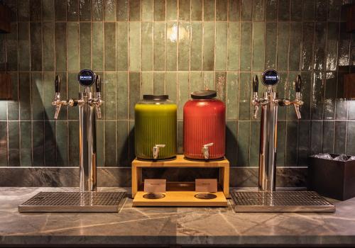 two kettles on a stand on a counter at The Square in Copenhagen