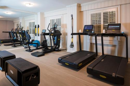 a gym with treadmills and elliptical machines at The Hay - Adams in Washington, D.C.