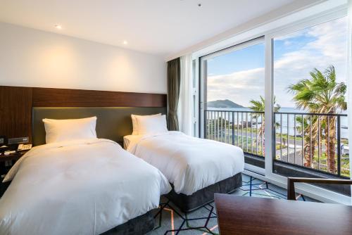 Imagen de la galería de Aguila Hotel Jeju Oceano Suite, en Jeju