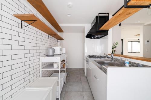 Yuka Hotel Komagome Family Stay - Playroom & Bikes - 2F