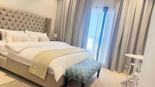 En eller flere senger på et rom på Beach front villa 1BHK