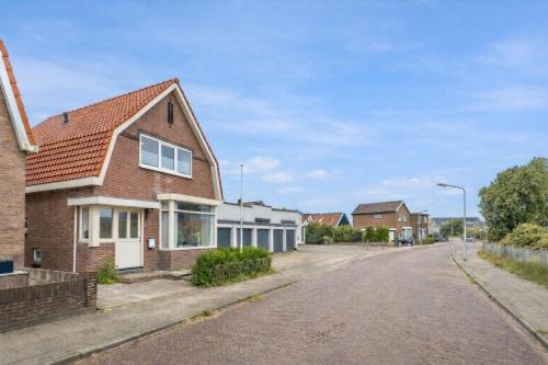 an empty street in a residential neighbourhood at Beachhouse Wijk aan Zee 6 guests near beach free parking in Wijk aan Zee