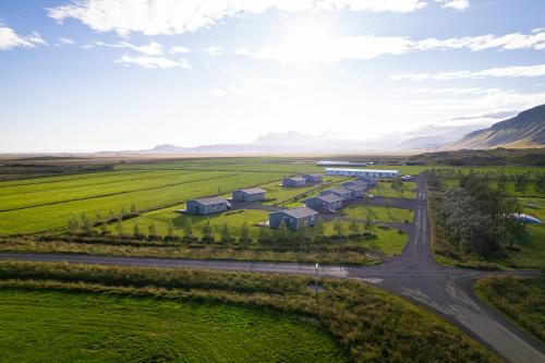 an aerial view of a farm with a road at Miðhraun - Lava resort & Restaurant in Midhraun