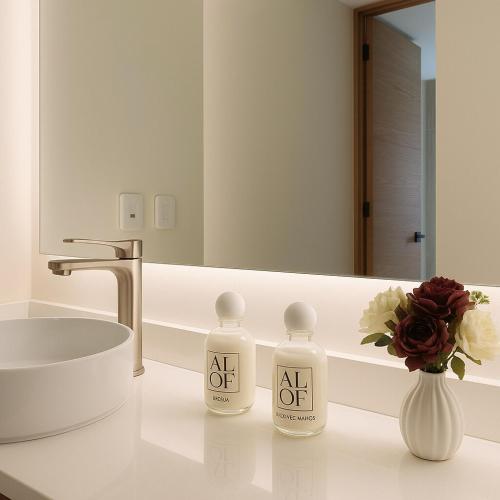 a bathroom with two white bottles on a counter at Alof Studio in the Jungle in Tulum