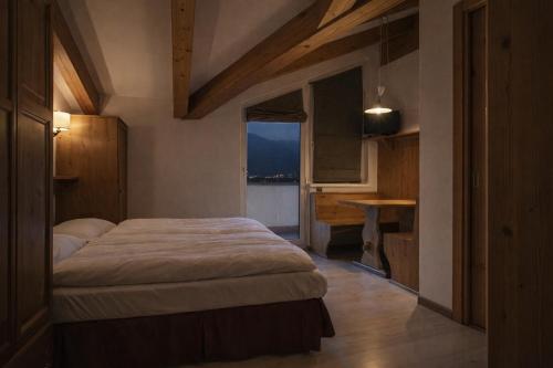 Postel nebo postele na pokoji v ubytování Sporting Aparthotel