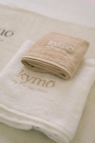 a folded napkin sitting on top of a towel at Kymo Fig Tree Bay House in Protaras