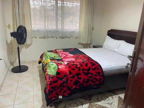 Katil atau katil-katil dalam bilik di Foday's residence