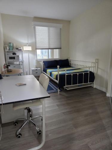 a small room with a bed and a desk at Resort Like Stay at a Cozy Relaxing Private Room Near UCI in Irvine