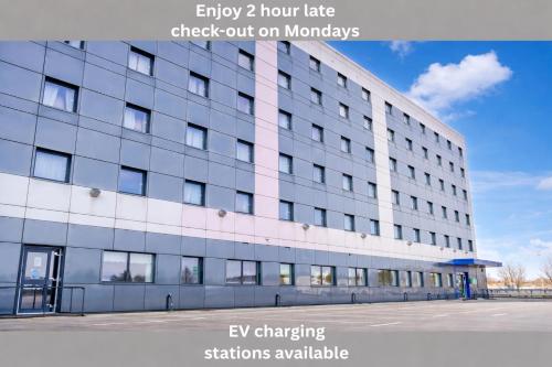 an office building with the words entry hour late check out on murkeys at Belvilla Aberdeen Bridge of Don Sea View in Aberdeen