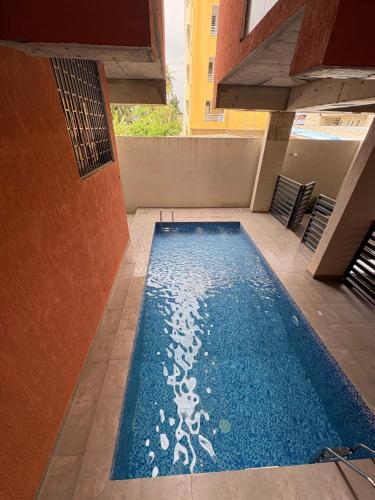 Piscina a Cozy Apartment o a prop