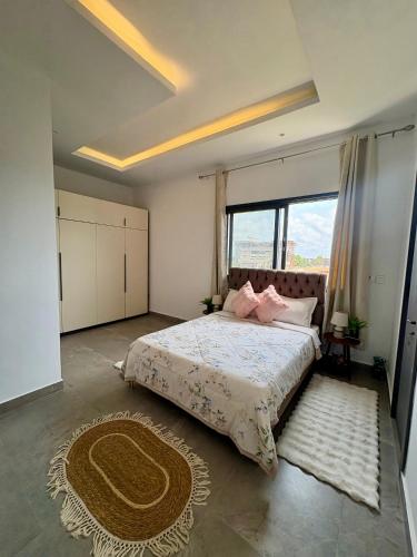 Llit o llits en una habitació de Cozy Apartment