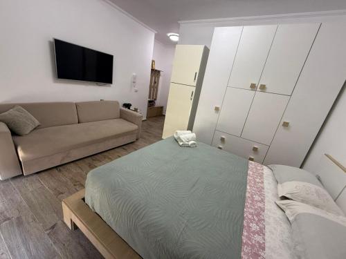 Телевізор і / або розважальний центр в Coco Apartments