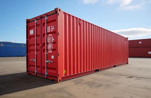 a large red container sitting in a parking lot at Abc in Primavera do Leste