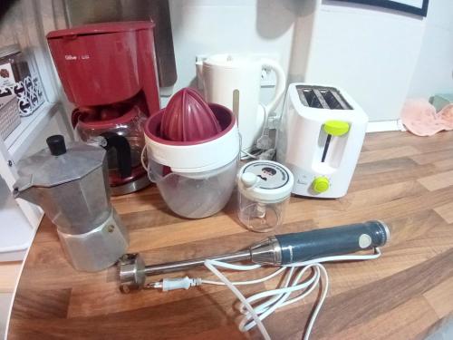 a counter with a blender and other appliances on it at MERINDADES AMAZUL CORZO - Apartamento Turístico - Medina de Pomar in Medina de Pomar
