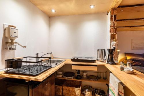 a small kitchen with a sink and a stove at Das Juwel in Erbach