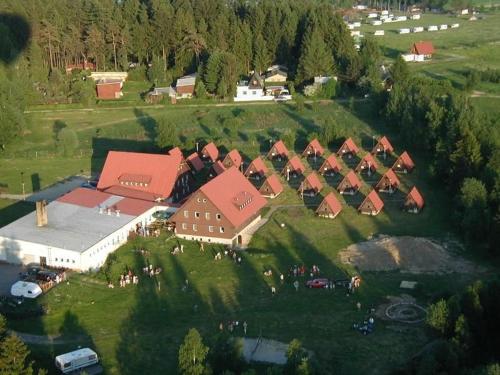 an aerial view of a farm with a group of houses at Penzion Athena in Velenov