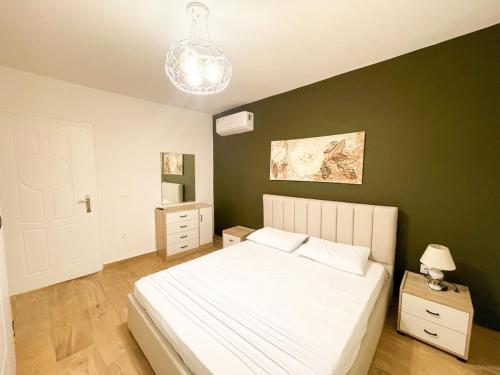 Gulta vai gultas numurā naktsmītnē NVater Apartment