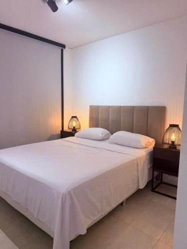 Llit o llits en una habitació de Feel Premiun 1203