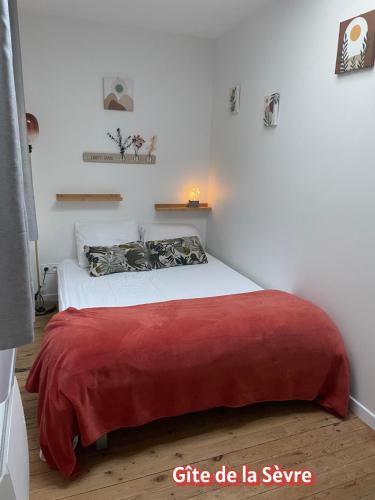 Llit o llits en una habitació de Maison de la Rochejaquelein
