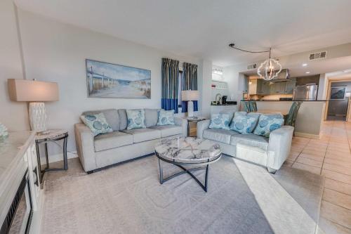 a living room with two couches and a table at Sea Pointe 2BR Condo Oceanview, Views, Large Condo in Myrtle Beach