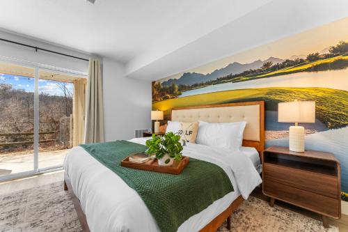 a bedroom with a large bed and a large window at Roark Home Suites - Branson Landing, Gym, Indoor Pool in Branson