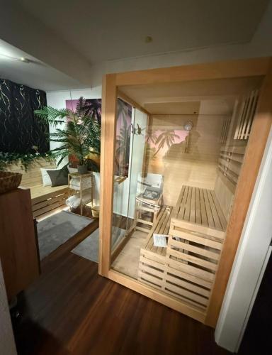 a view of a room with a glass door at Private Spa Suite bei Heilbronn - Romantik, Wellness & absolute Privatsphäre in Massenbachhausen