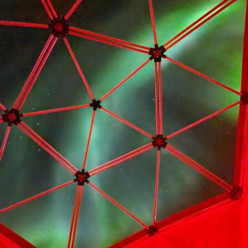an umbrella with a green sky in the background at Skaland panorama in Senja